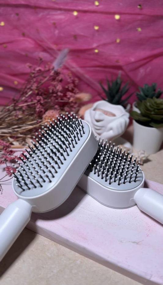 Self cleaning hair brush